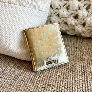 Kate Spade Metallic Gold Embossed Bow Wallet
